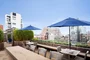 Perfectly planned landscaping on the rooftop terrace offers the ideal location to take in sweeping views of the Hudson River.