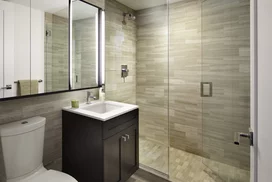 Custom bathrooms with oversized custom medicine cabinets.