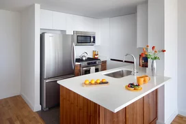 Gourmet kitchens feature stainless steel appliances. 