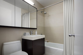 These luxury apartments feature baths with marble top vanities and large-sized mirrors.