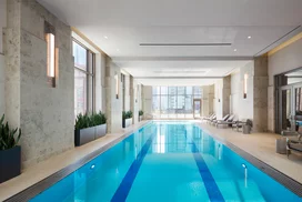 60 ft. indoor pool with access to an outdoor terrace overlooking Bennett Park.