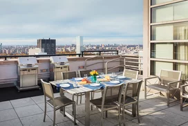 This lushly landscaped sun terrace complete with lounge chairs, tables and chairs provides the perfect setting to relax, refresh and recharge while enjoying views of the city.