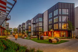 Landscaped courtyards with outdoor grills and dining