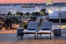 Landscaped rooftop with gunite swimming pool, two hot tubs, and resort-style sun terrace.