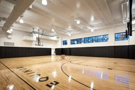 On-site full regulation basketball court.